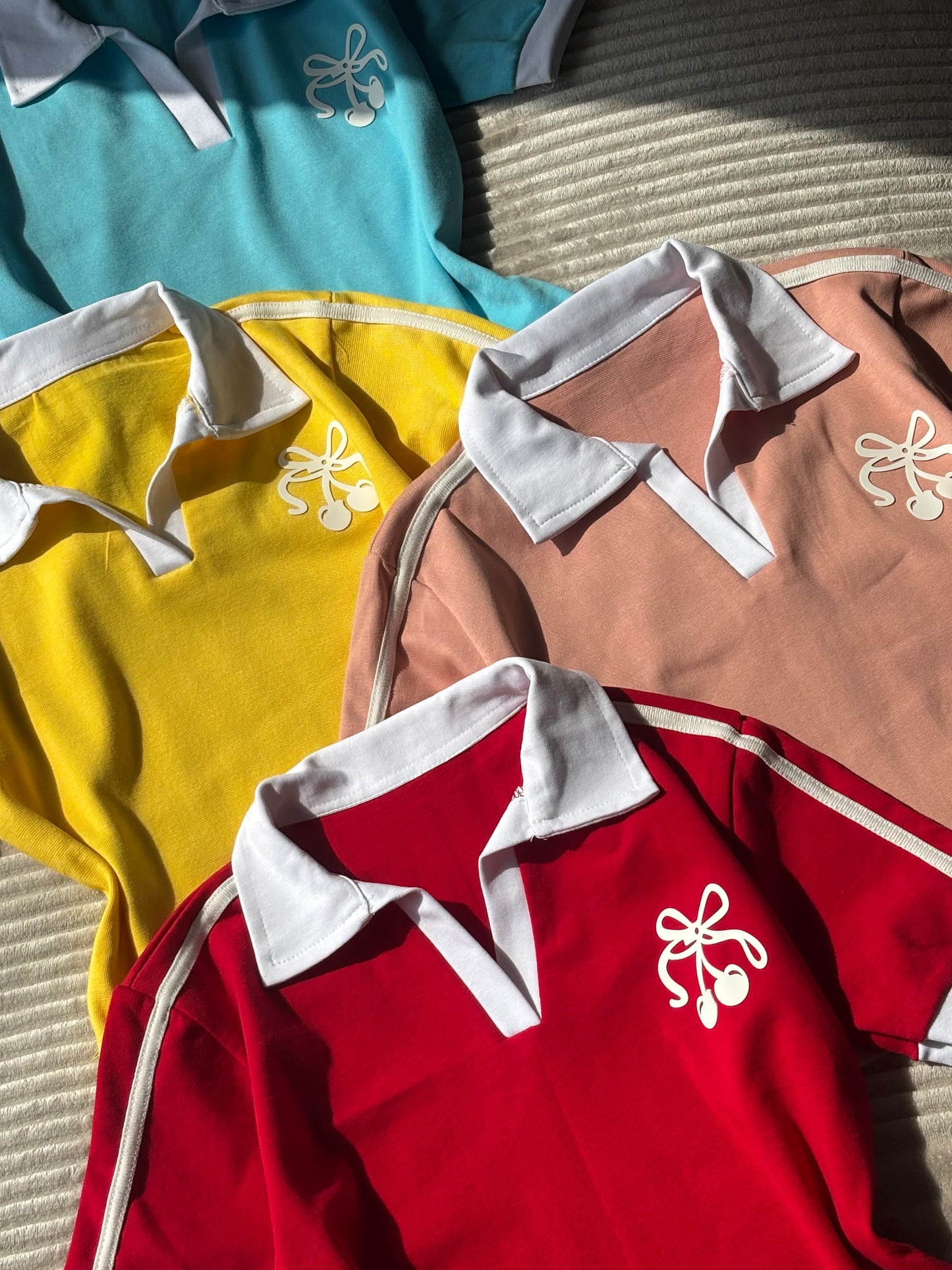 Cherry polo tees