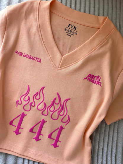 "Party Monster" Peachy Orange Back Print Crop Tee
