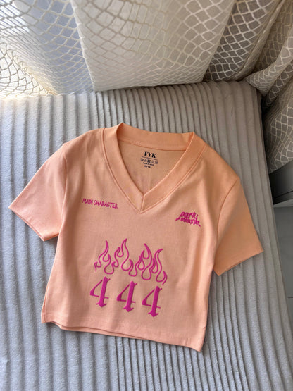 "Party Monster" Peachy Orange Back Print Crop Tee