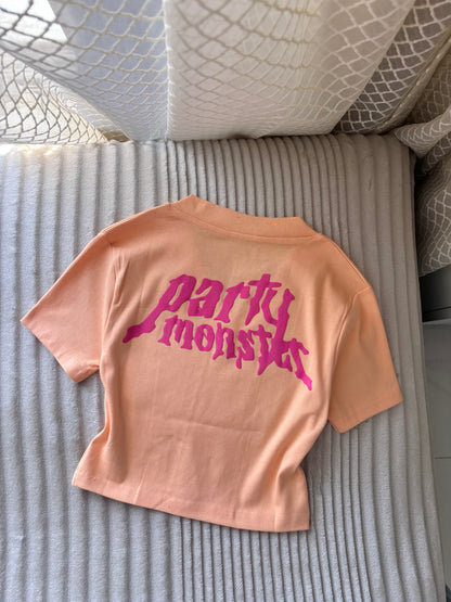 "Party Monster" Peachy Orange Back Print Crop Tee