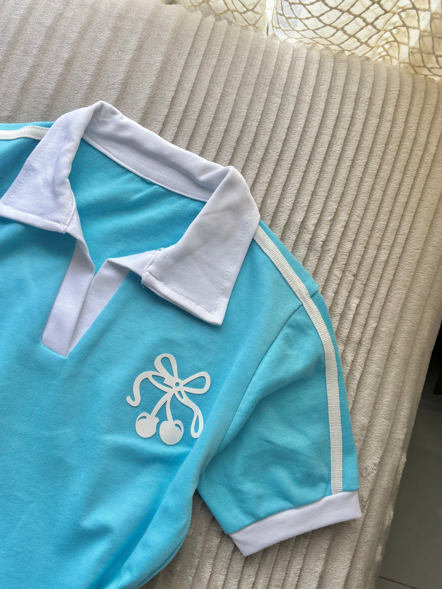 Cherry polo tees
