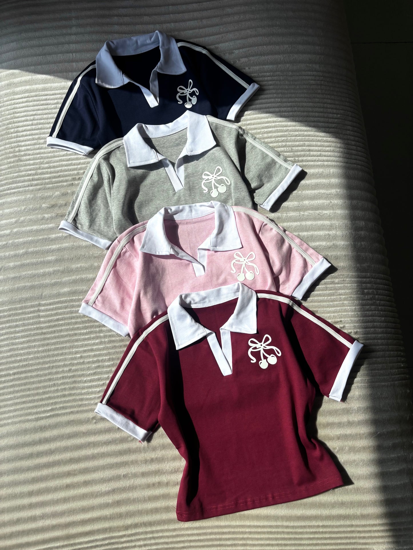 Cherry polo tees
