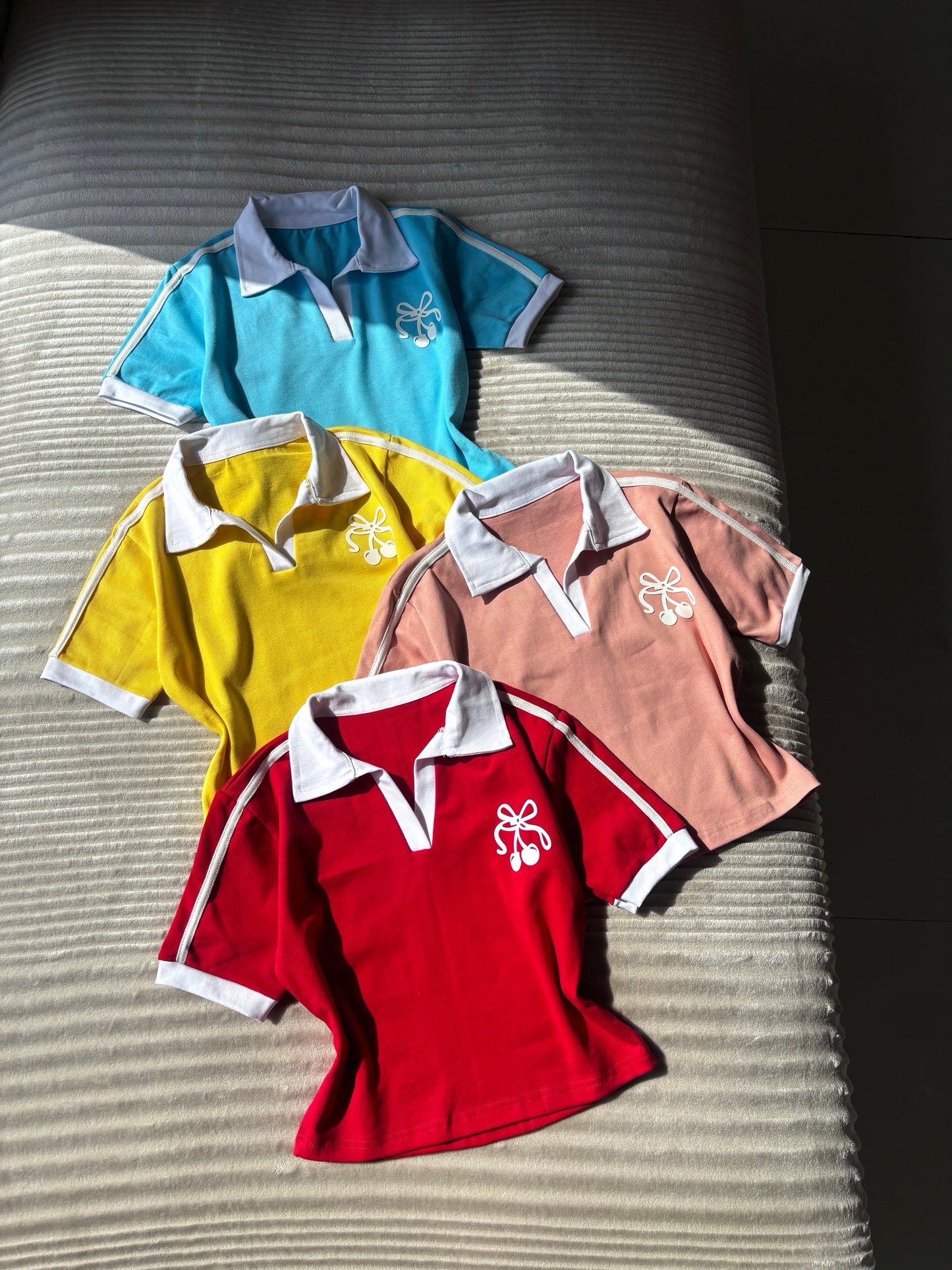 Cherry polo tees