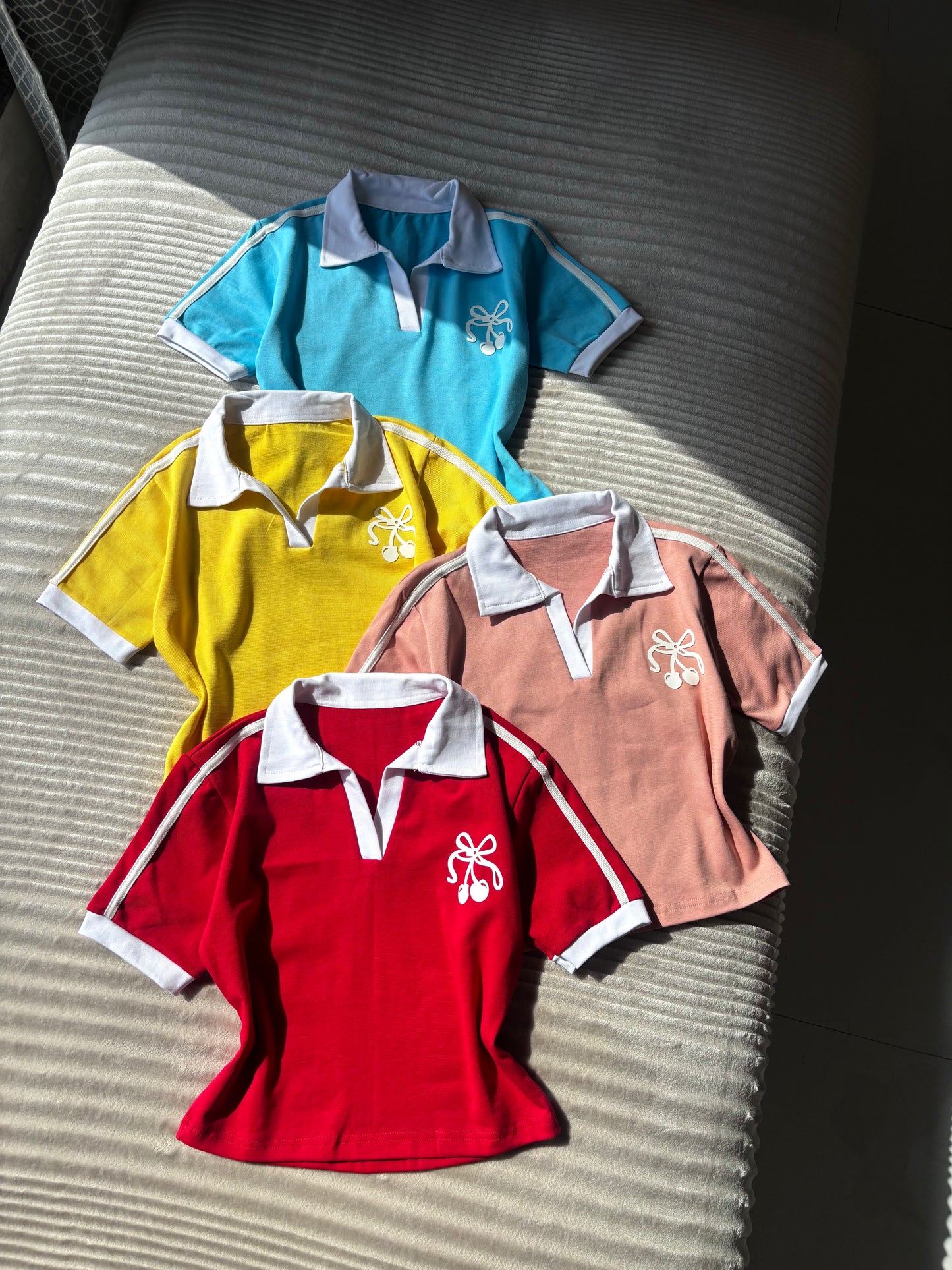 Cherry polo tees